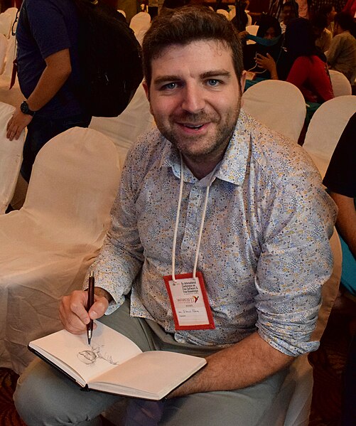 File:David Revoy sketches Todd Weaver at Swatantra 2017.jpg